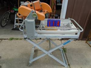 Chicago Electric 10� tile saw with tray, pump & stand. Good working condition. As shown.