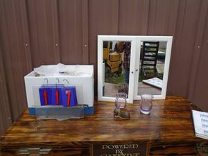 Box of glassware & medicine cabinet. As shown.