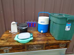 Rubbermaid with coleman cooler & fry daddy, etc. As shown.
