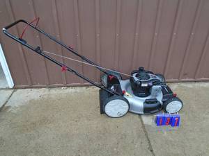 Murray push mower. Looks nearly new. Tested & works. As shown.