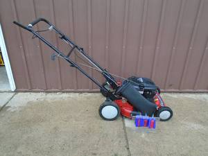 6.5 hp Snapper mowerleaf collector. No bag. Nice condition. Missing one wheel adjuster.