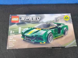 lot 113 image: LEGO Speed Champions Lotus Evija 76907 Race Car Toy Model for Kids, Collectible Set with Racing Driver Minifigure