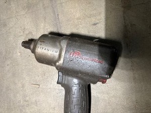 lot 52 image: Four Air Impact Wrenches