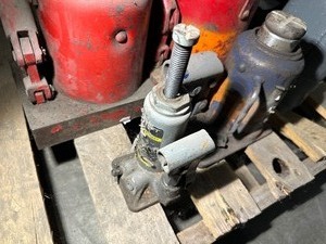 lot 53 image: Four Bottle Jacks