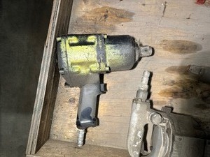 lot 56 image: Four Air Impact Wrenches