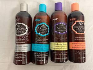 lot 31 image: 4 Bottles of Different Hask Shampoos