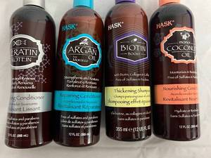 lot 34 image: 4 Bottles of Different Hask Shampoos