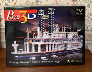 lot 90 image: Two New Titanic and Mississippi Steamboat Puzzles by Puzz 3D