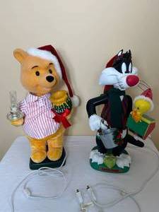Looney Toons Sylvester the Cat and Disneys Winnie the Pooh Animated Light Up Figurines