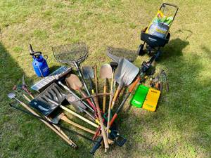 Assortment of Lawn Care - Reminington Electric Pole Saw, Yard Works Lawn Spreader plus bag of weed and Feed, rakes, shovels, hand tools, pruners, yard sprayer and axes