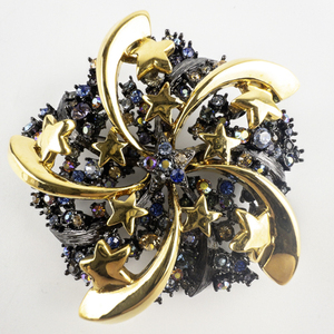 lot 83 image: Joan Rivers Starry Night Galaxy Swirling Star Gold Tone Base Metal Brooch .