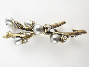lot 87 image: Joan Rivers Simulated Pearl With Rhinestone Accented Branch Gold Plated Base Metal Brooch .