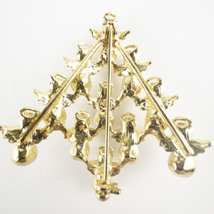 lot 95 image: AVON Angel Christmas Guardian Pearl Gold Tone Base Metal Brooch .