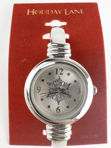 lot 33 image: Ladys Macys  Holiday Lane Winter Snowflake Silver tone stainless steel Quartz Analog watch. New Battery Installed