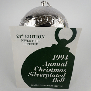 lot 70 image: Wallace Silversmiths  1994 Festive Bells silver plate Christmas Sleigh Bell Ornament . 24th Edition