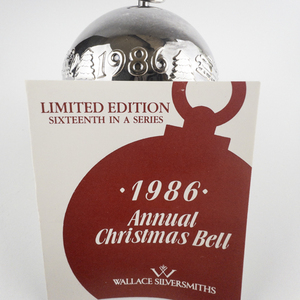 lot 68 image: Wallace Silversmiths  1986 Coasting Children silver plate Christmas Sleigh Bell Ornament . Limited Edition. 16th in a series.