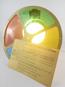 lot 220 image: Vintage Revolving Colored Lens. Working