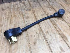 lot 79 image: RV 30A50A Adapter