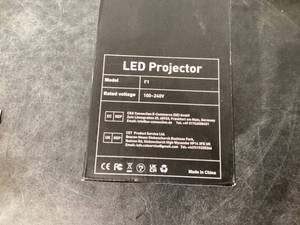 lot 541 image: HOMPOW Mini Portable Projectors F1