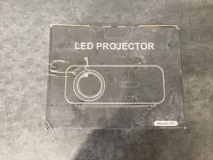 lot 542 image: HOMPOW Mini Portable Projectors F1