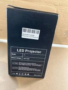 lot 551 image: HOMPOW Mini Portable Projectors F1