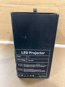 lot 561 image: HOMPOW Mini Portable Projectors F1