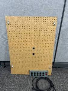 lot 30 image: Peg Board with Belkin Power Strip Attached