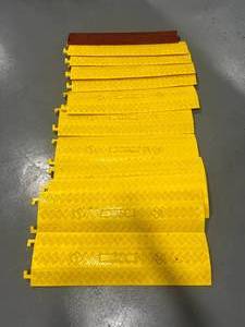 lot 65 image: Lot of 12- floor cable protectors