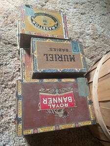Basket with cigar boxes
