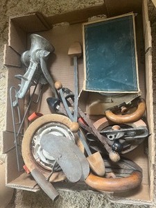 Vintage popcorn popper, cast lampholders, iron, belt buckles