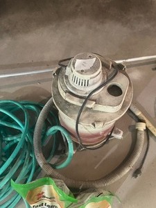 Roof rake, grass seed, garden hose