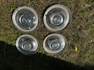 lot 809 image: Studebaker 15 Inch Chrome Hubcaps, Set Of 4