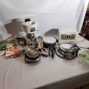 lot 647 image: Vintage Kitchen Small Appliances Including Air Purifier 2 Waffle Makers Blender with Juicer attachment