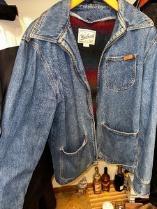 lot 896 image: Lined Woolrich Denim Jean Jacket