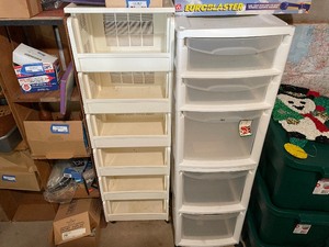 lot 776 image: Set Of 3 Towers Of Plastic Storage Containers - All Three Are 54 Inches High And 16 Inches Wide