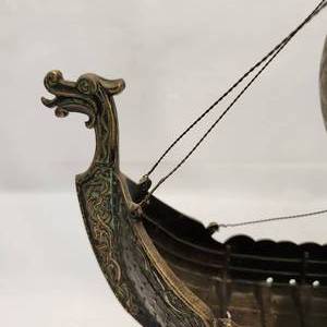 lot 604 image: Vintage Edward Aagaard Bronze Viking Ship 16 long on Stand - Rare Find, Box Dates it as 1902 Estimated Value $250-750