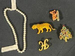 lot 167 image: Lot of Assorted Costume Jewelry with Pins and Necklace