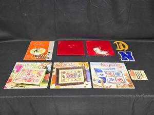 lot 51 image: Lot of Keepsake Cross Stitch Calendars and Cinerama Holiday Booklets