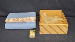 lot 94 image: Vintage Blue Satin-Trimmed Blanket with Travel Clock
