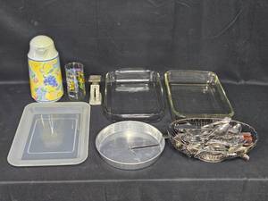 lot 114 image: Kitchenware Lot Inc Assorted Normandy Stainless Silverware, Pyrex Dishes, Metal Tray, Vintage Thermos, and More