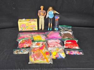 lot 141 image: Vintage Barbie and Ken Dolls with Assorted Accessories and Clothing