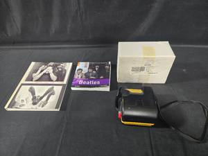 lot 186 image: Lot of Books and Polaroid Camera