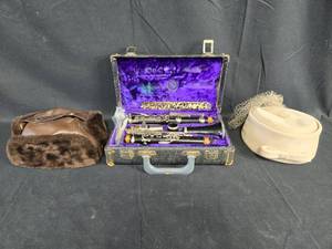lot 216 image: Vintage Leblanc Clarinet with Case, Mink Hat, and Veiled Hat