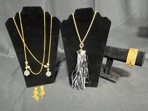 lot 235 image: Vintage Jewelry Lot Necklaces, Earrings, and Bracelet - displays not included