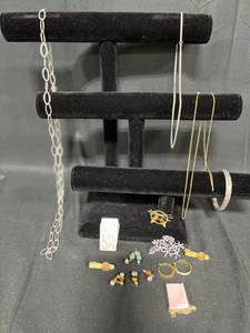 lot 256 image: Lot of Assorted Jewelry Items Necklaces, Earrings, Pins, and More - displays not included