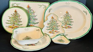 lot 104 image: Christmas Party Spode English Christmas Tree Dishes Including Platters, Placemat, Coasters and More