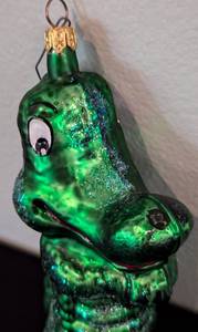 lot 171 image: Christopher Radko Croc Cutie Glass Ornament