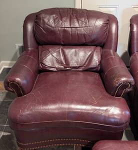 lot 5 image: Pair of Hancock and Moore Leather Armchairs and Ottoman
