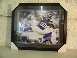 lot 12 image: MINNESOTA VIKINGS Danielle Hunter AUTOGRAPHED WITH COA Official NFL professionally framed photo, Approx 27 by 23 - NEW - A VERY NICELY DONE PIECE - SEE PICTURES