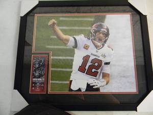 lot 53 image: TAMPA BAY BUCCANEERS TOM BRADY SUPER BOWL LV CHAMPS  MVP Official NFL professionally framed photo, Approx 26 by 22 - NEW - A VERY NICELY DONE PIECE - SEE PICTURES